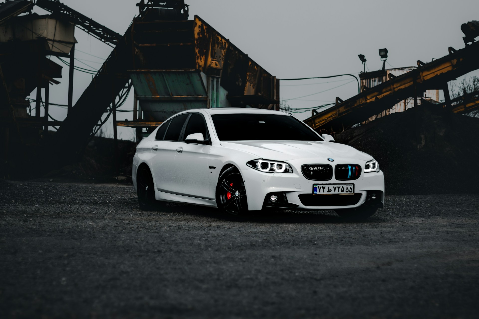 a white car parked in a parking lot
