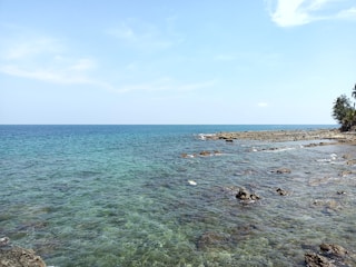Coastal view of Vizag with clear blue skies and calm sea.