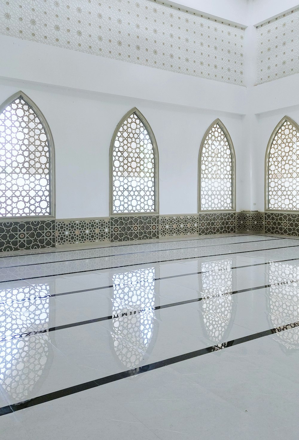 an empty swimming pool in a large building