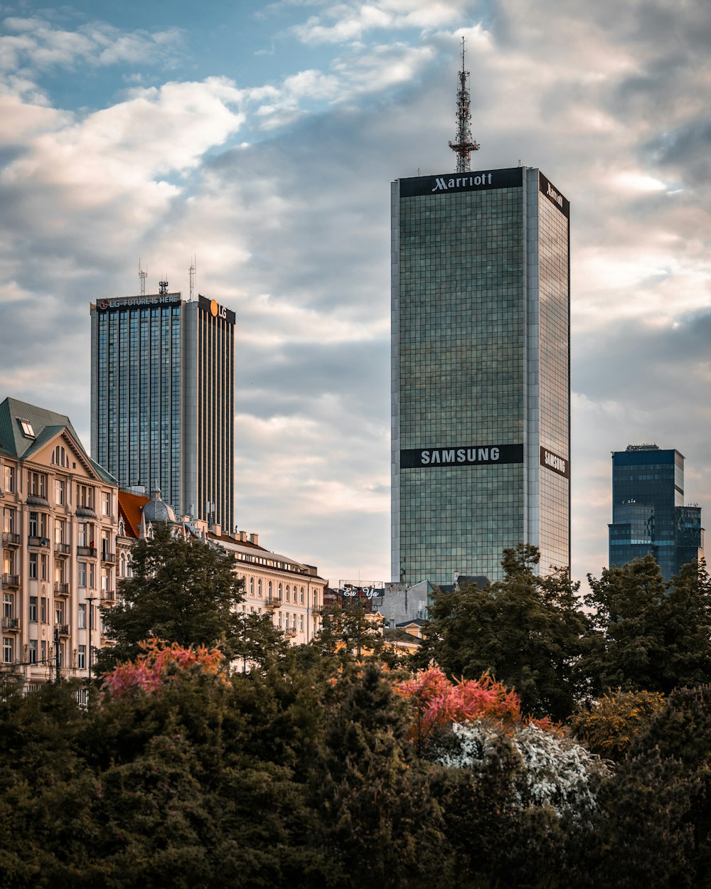 a tall building with a samsung logo on it