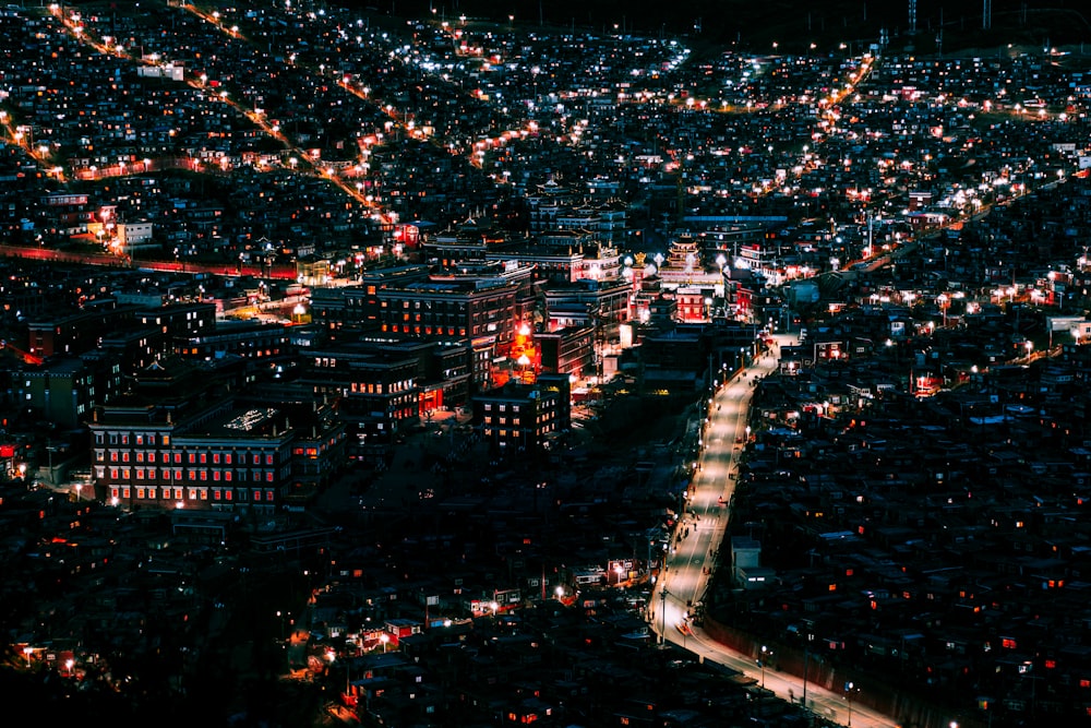 an aerial view of a city at night