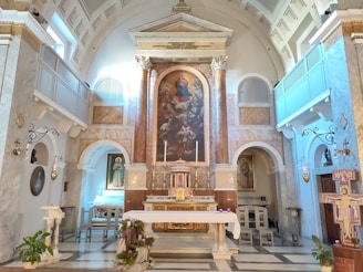 A serene view of the ancient church altar adorned with traditional Orthodox icons and candles.