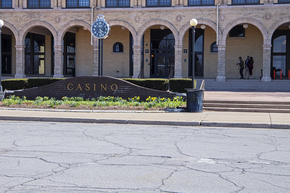 a large building with a sign in front of it