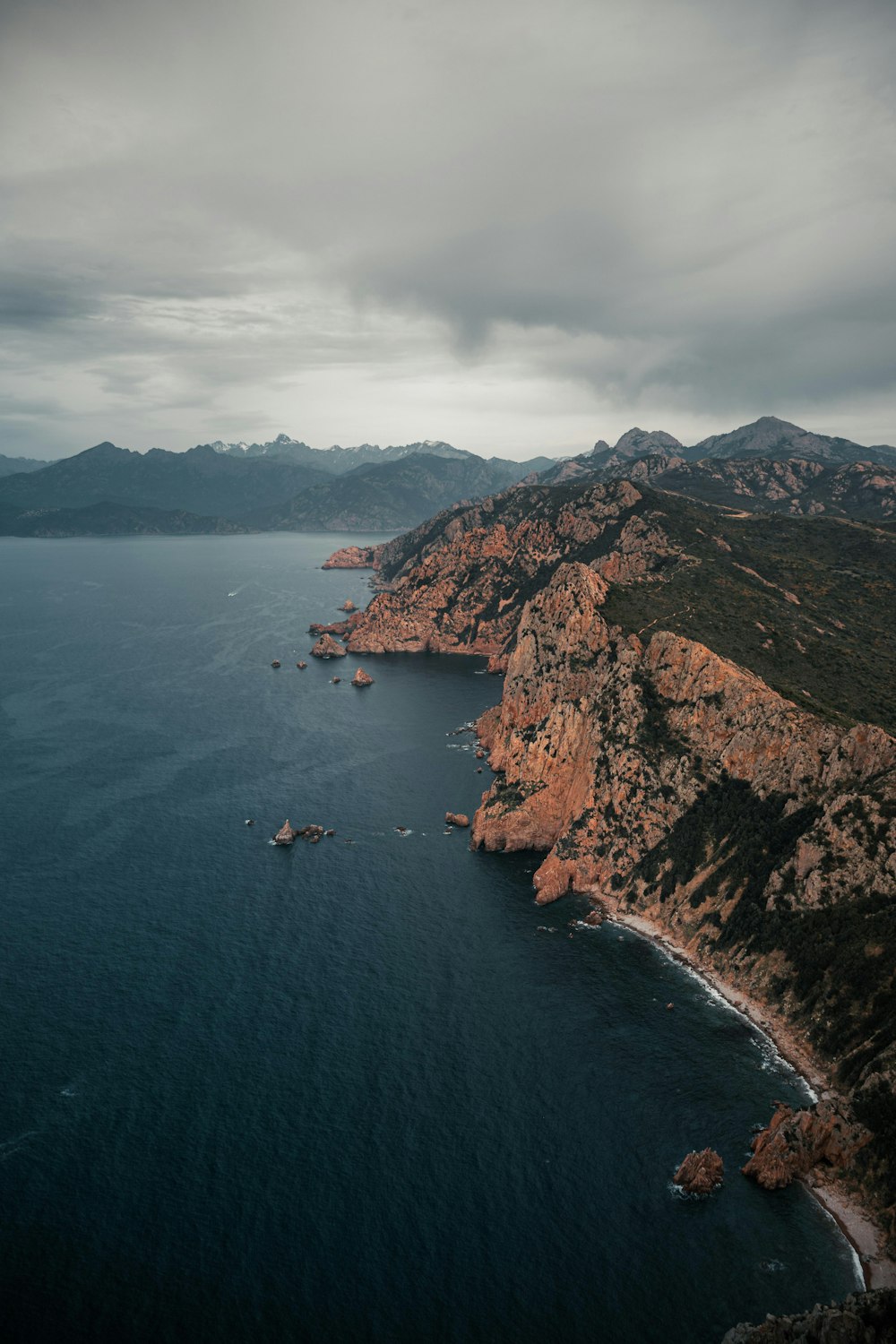 a large body of water surrounded by mountains