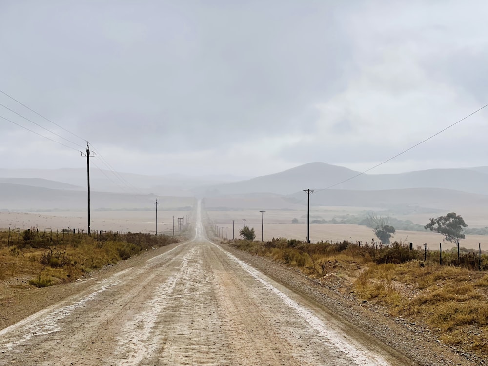 a dirt road in the middle of nowhere