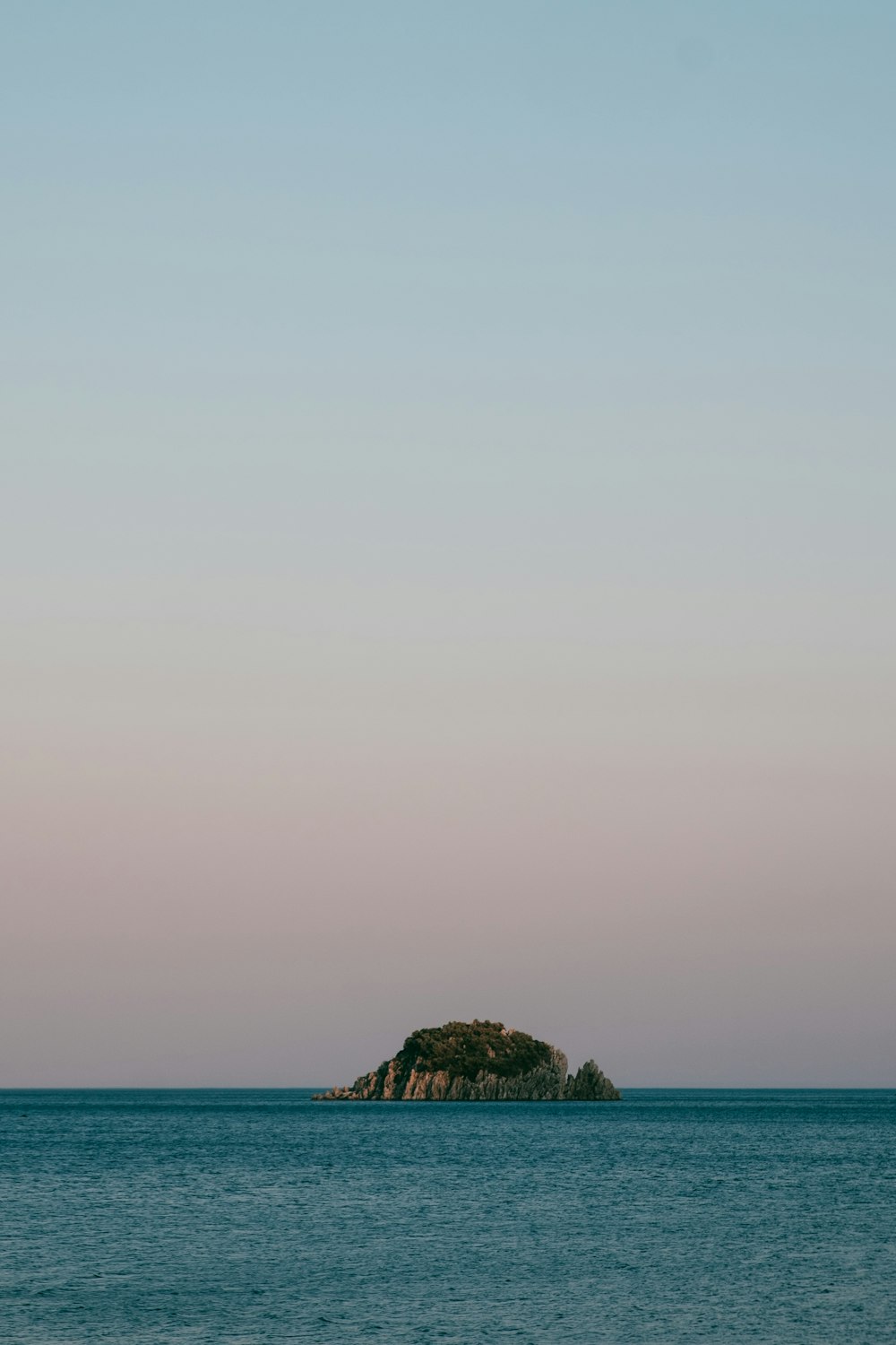 a small island in the middle of the ocean