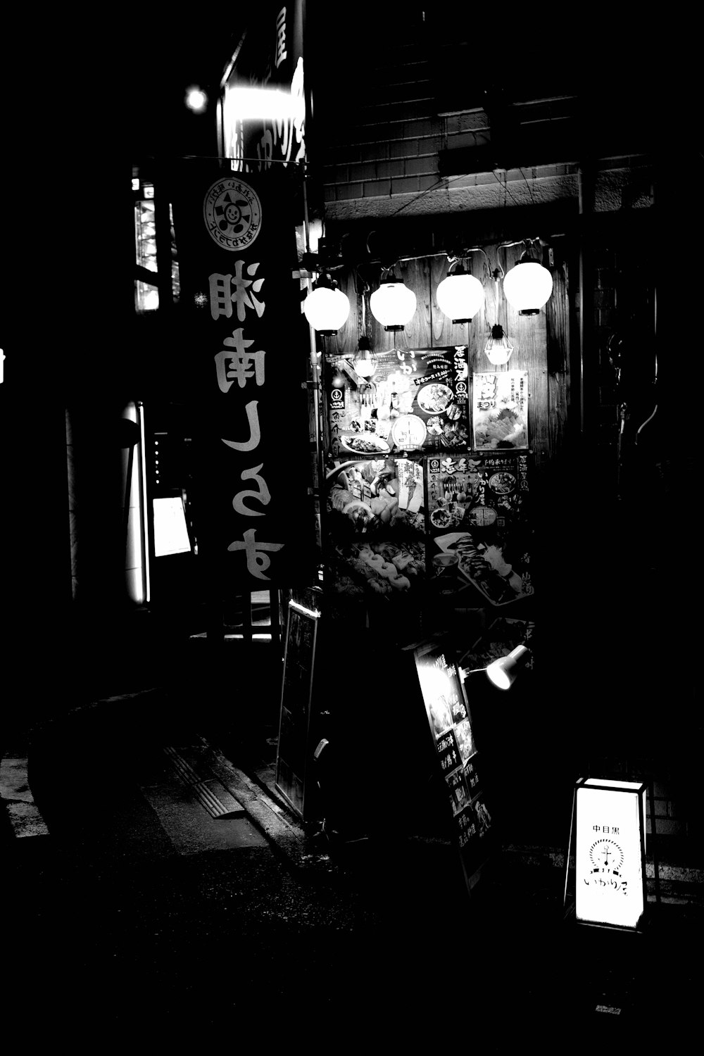 a black and white photo of a store front