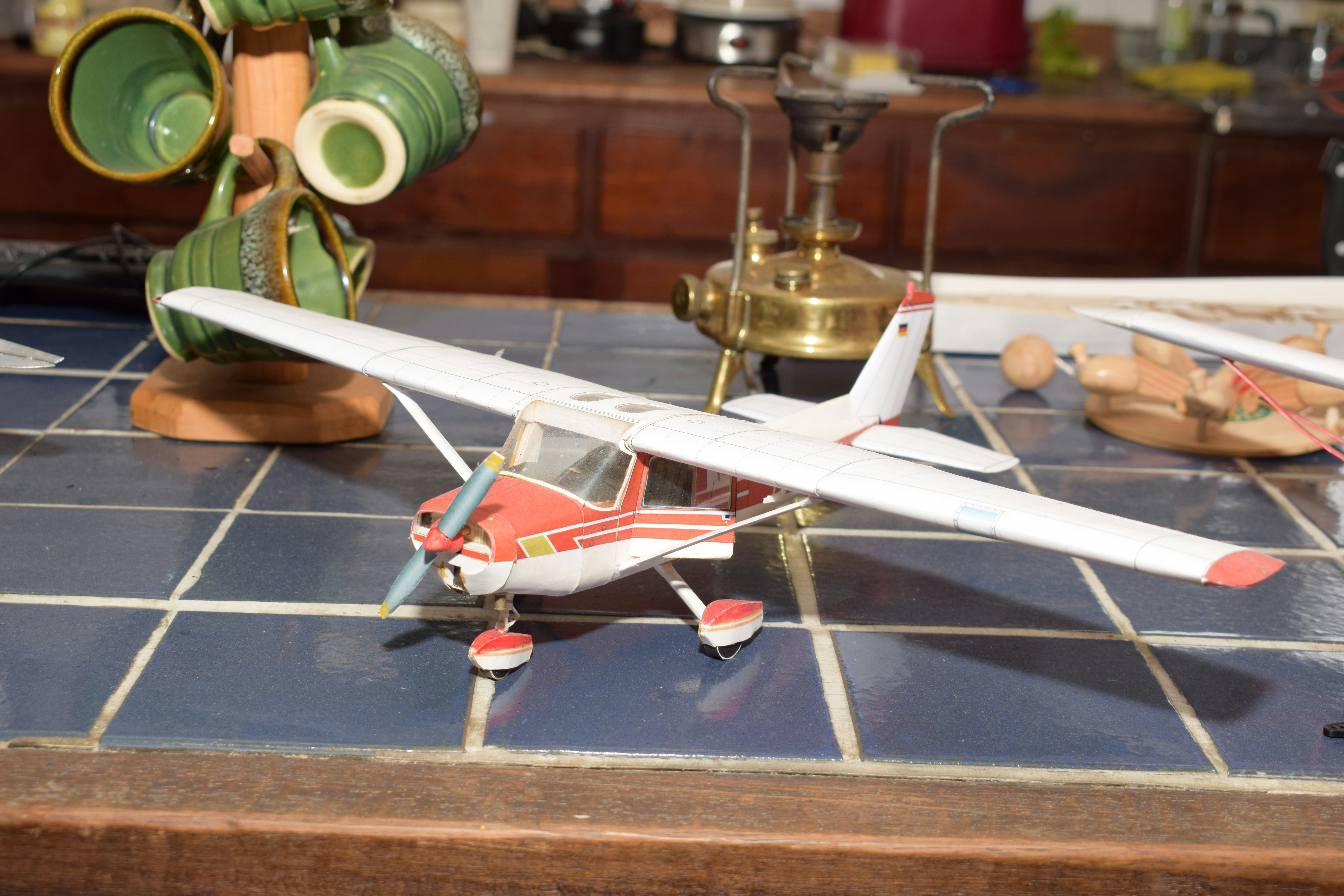 a toy airplane sitting on top of a table