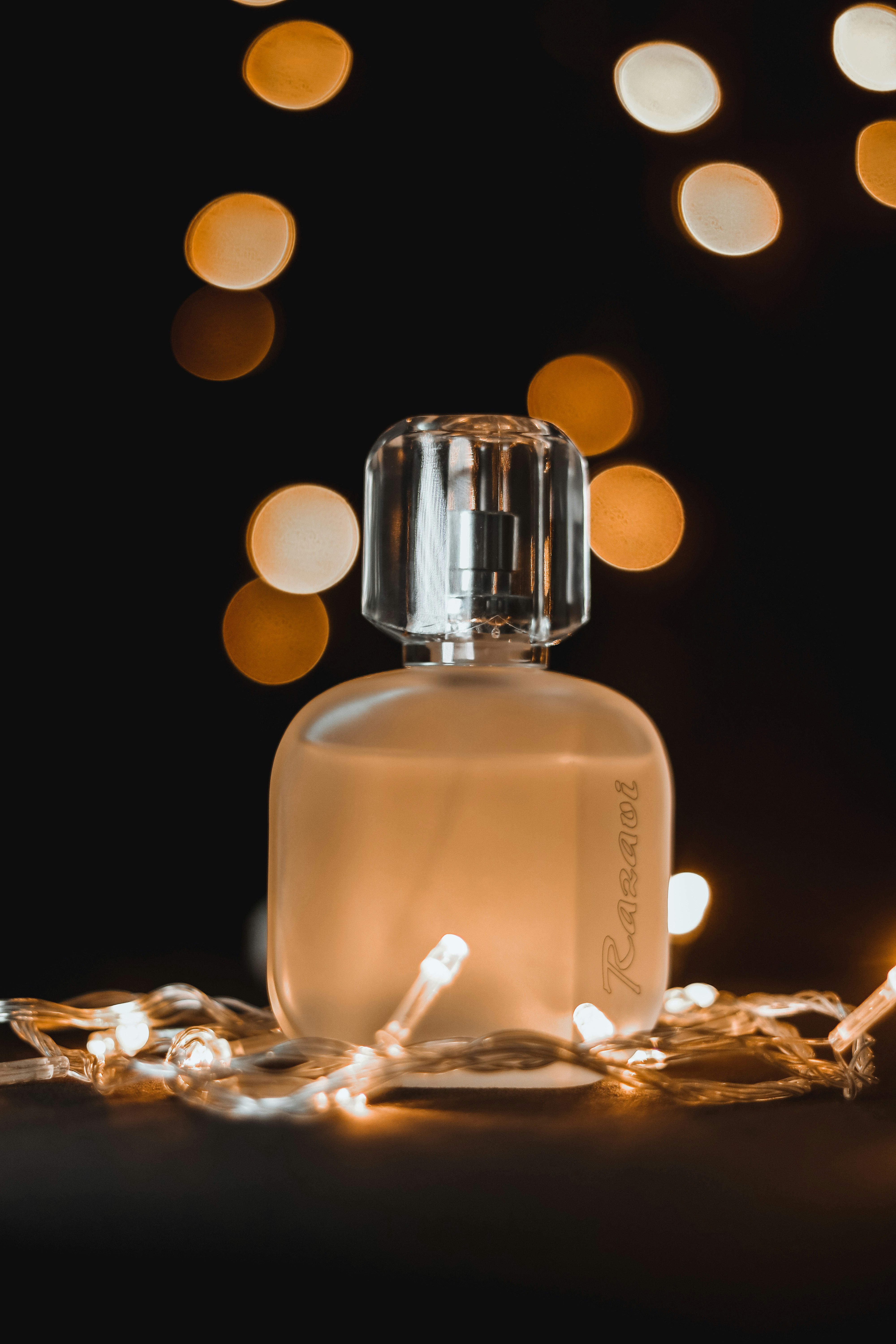 a bottle of perfume sitting on top of a table