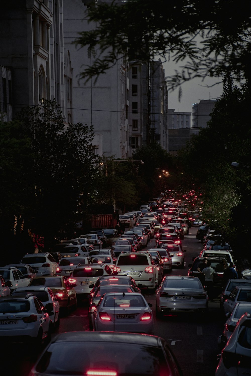 a city street filled with lots of traffic