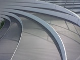 Architectural steel grates used in modern building designs.