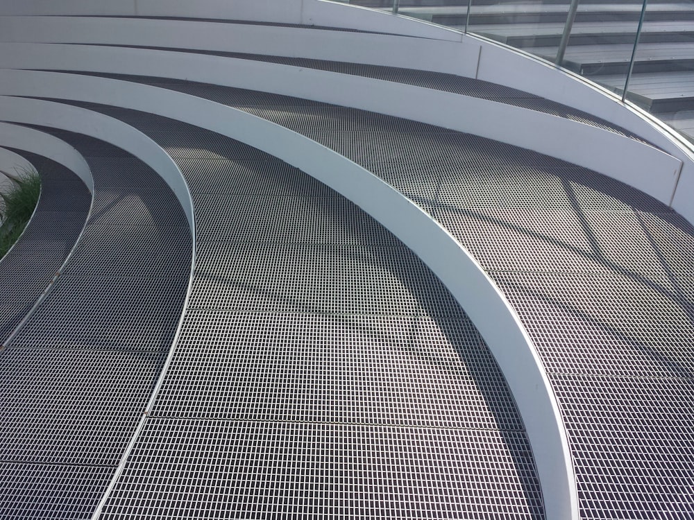 a close up of a curved metal structure