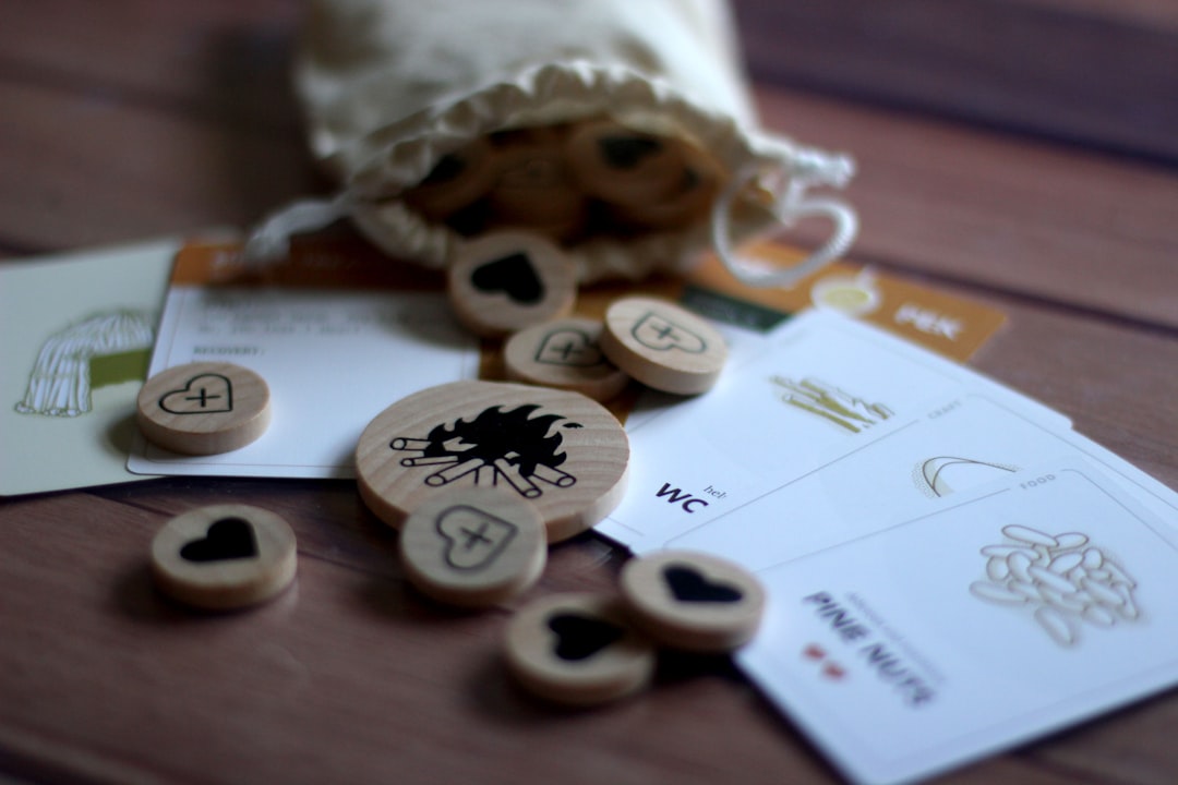 a bunch of wooden buttons sitting on top of a table