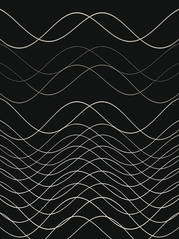 a black and white photo of wavy lines