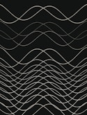 a black and white photo of wavy lines