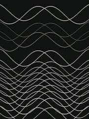 a black and white photo of wavy lines