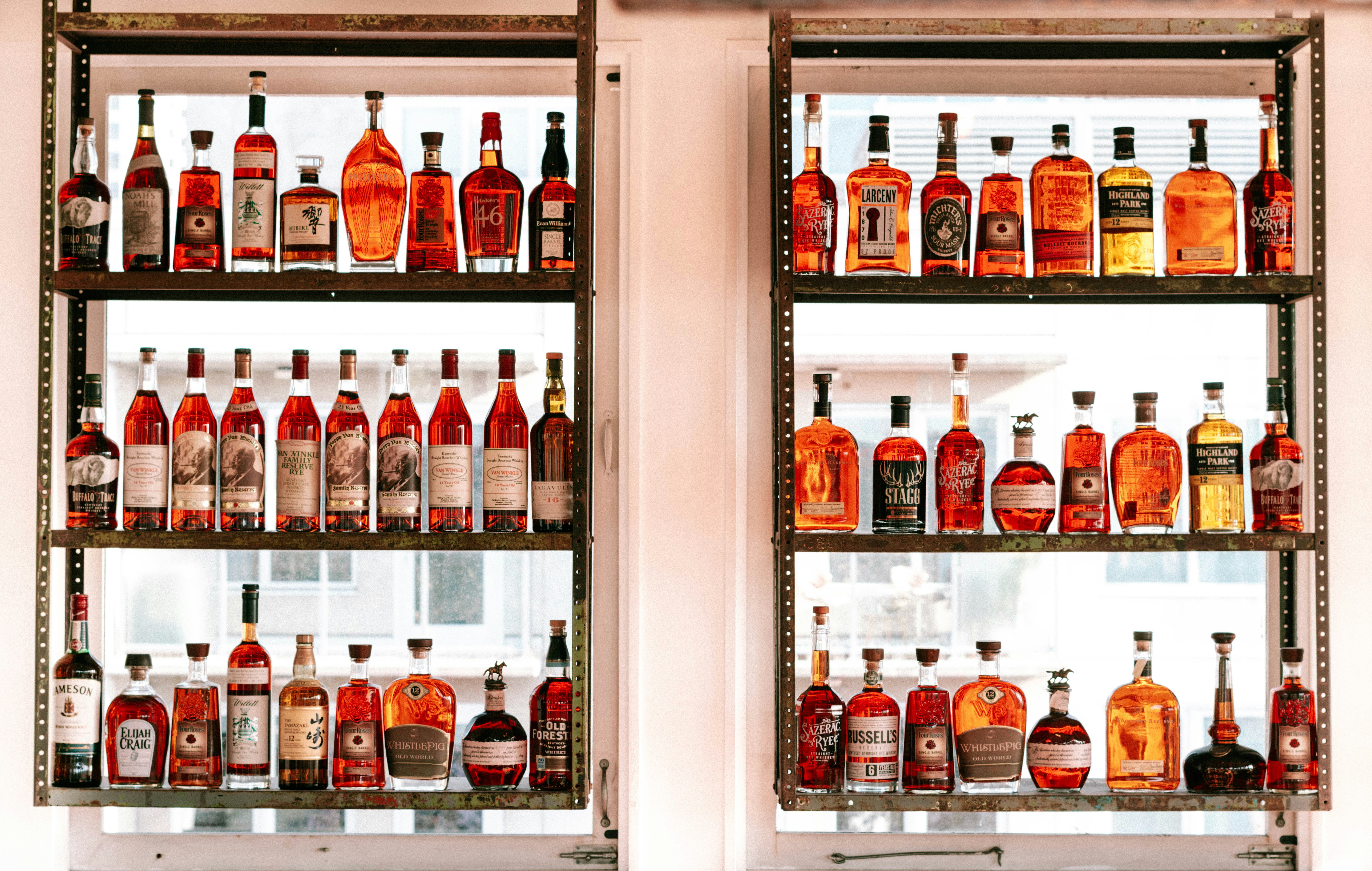 Urban rooftop bar with liquor shelves