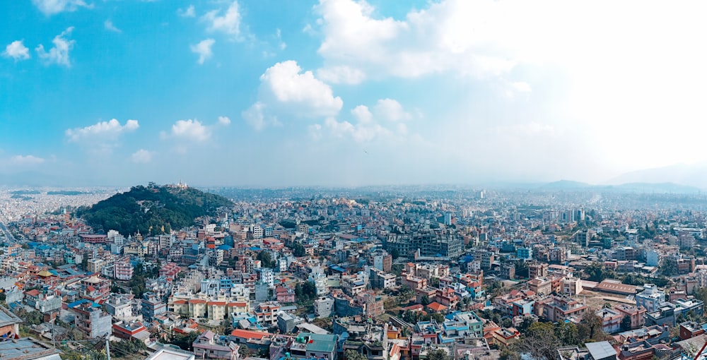 a view of a city from the top of a hill