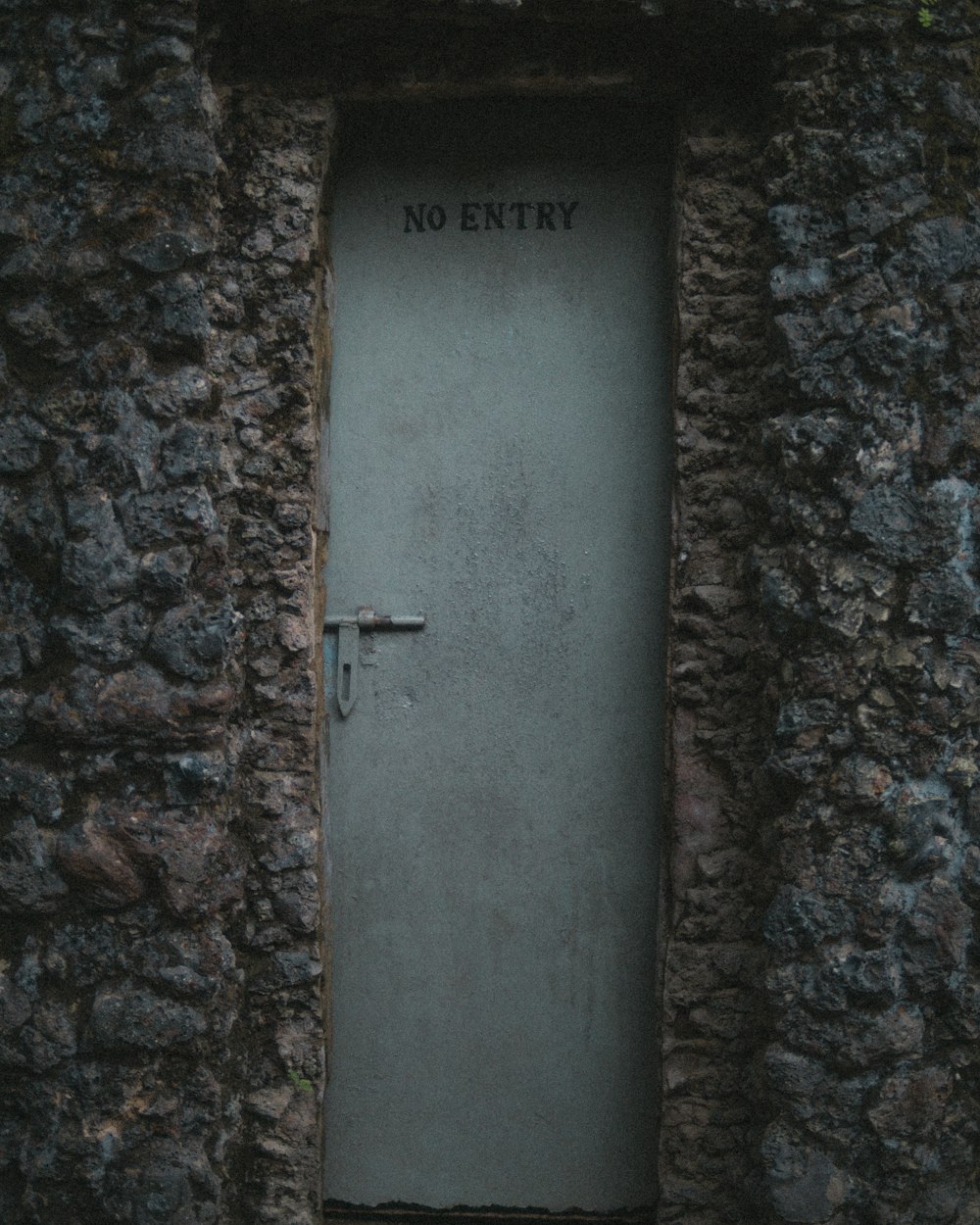 a door that is in a stone wall