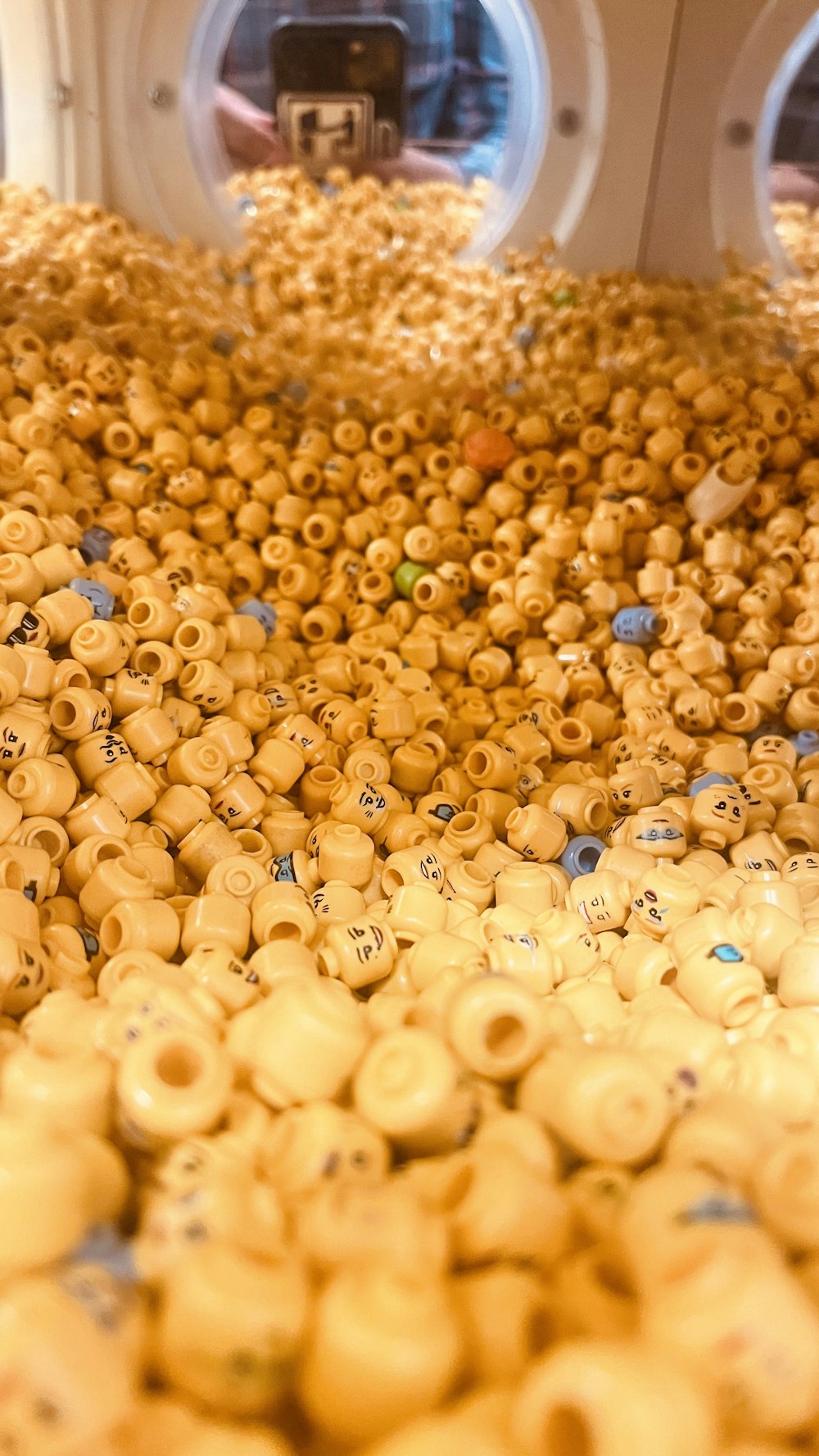 a large amount of macaroni and cheese on a conveyor belt