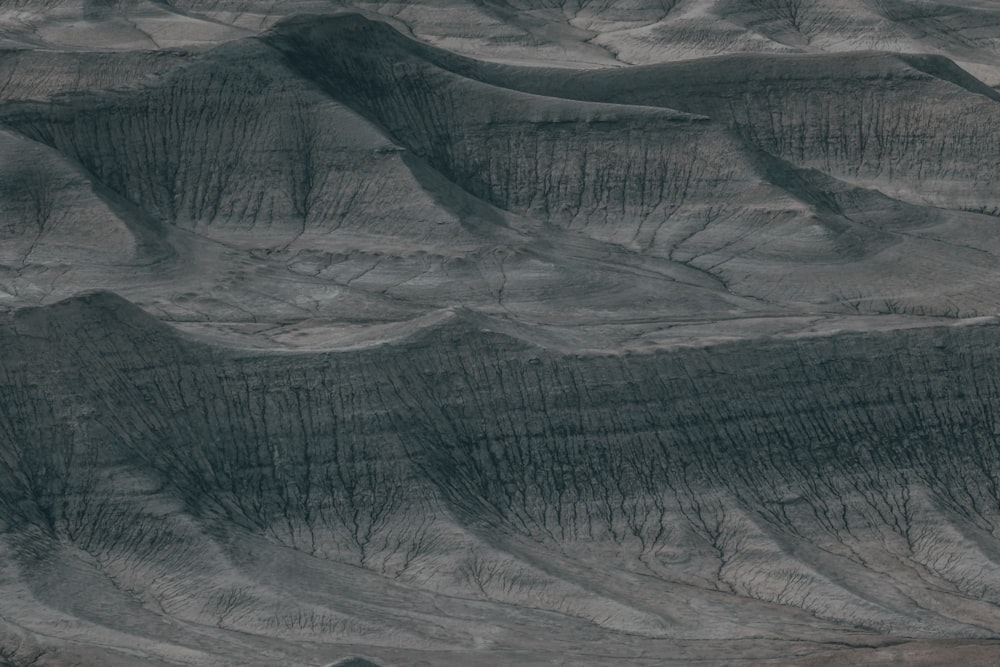 an aerial view of a mountain range in the desert