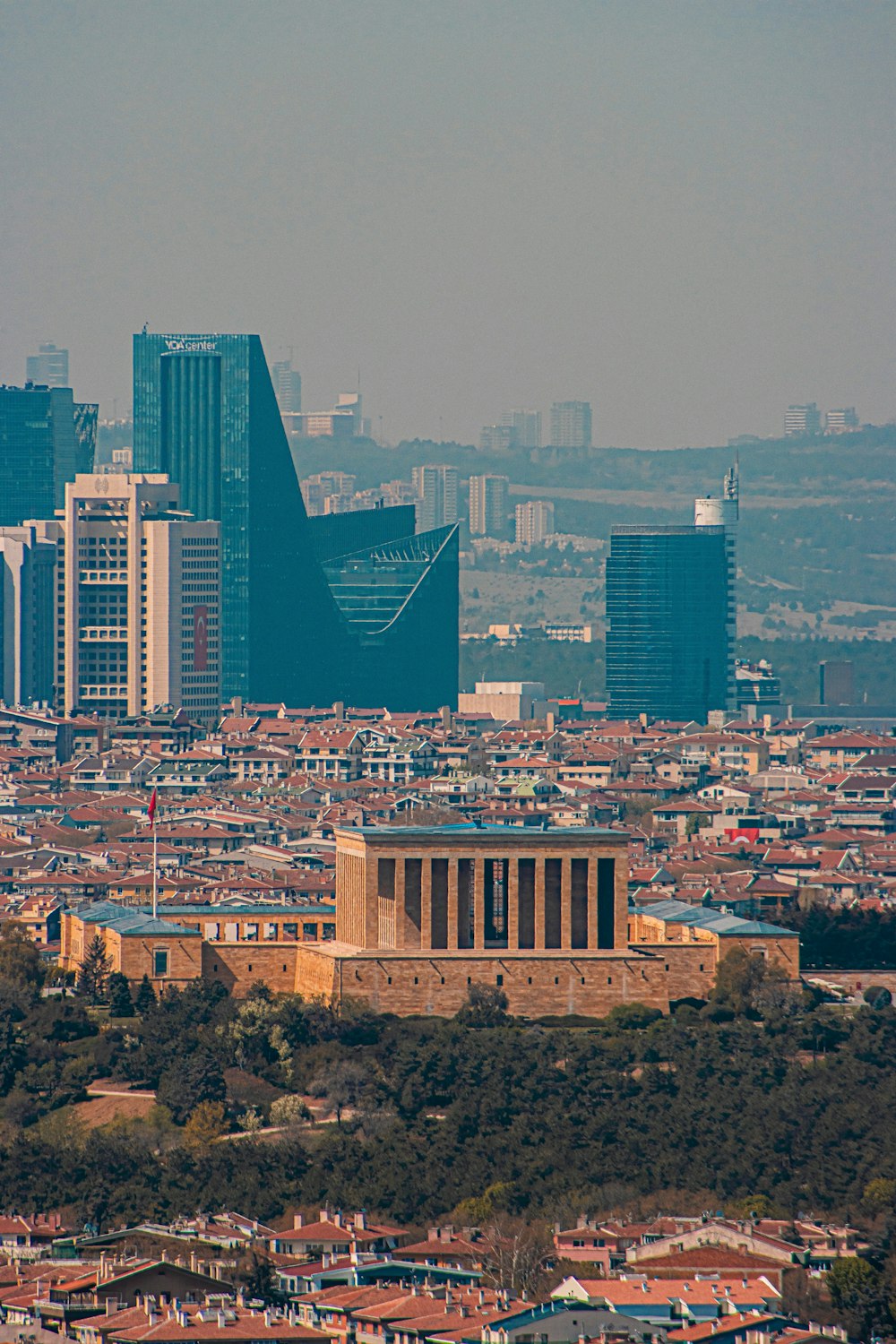 a view of a city with tall buildings