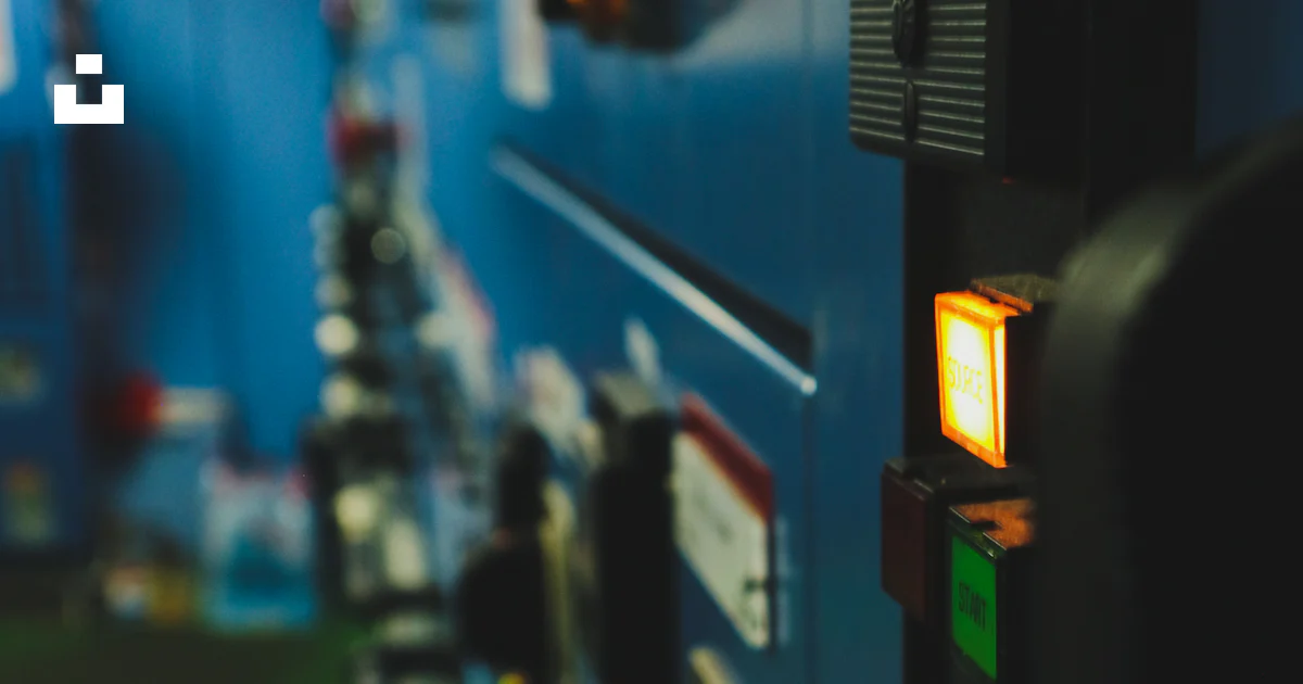 A row of lights on a wall in a room photo – Free Ship Image on Unsplash