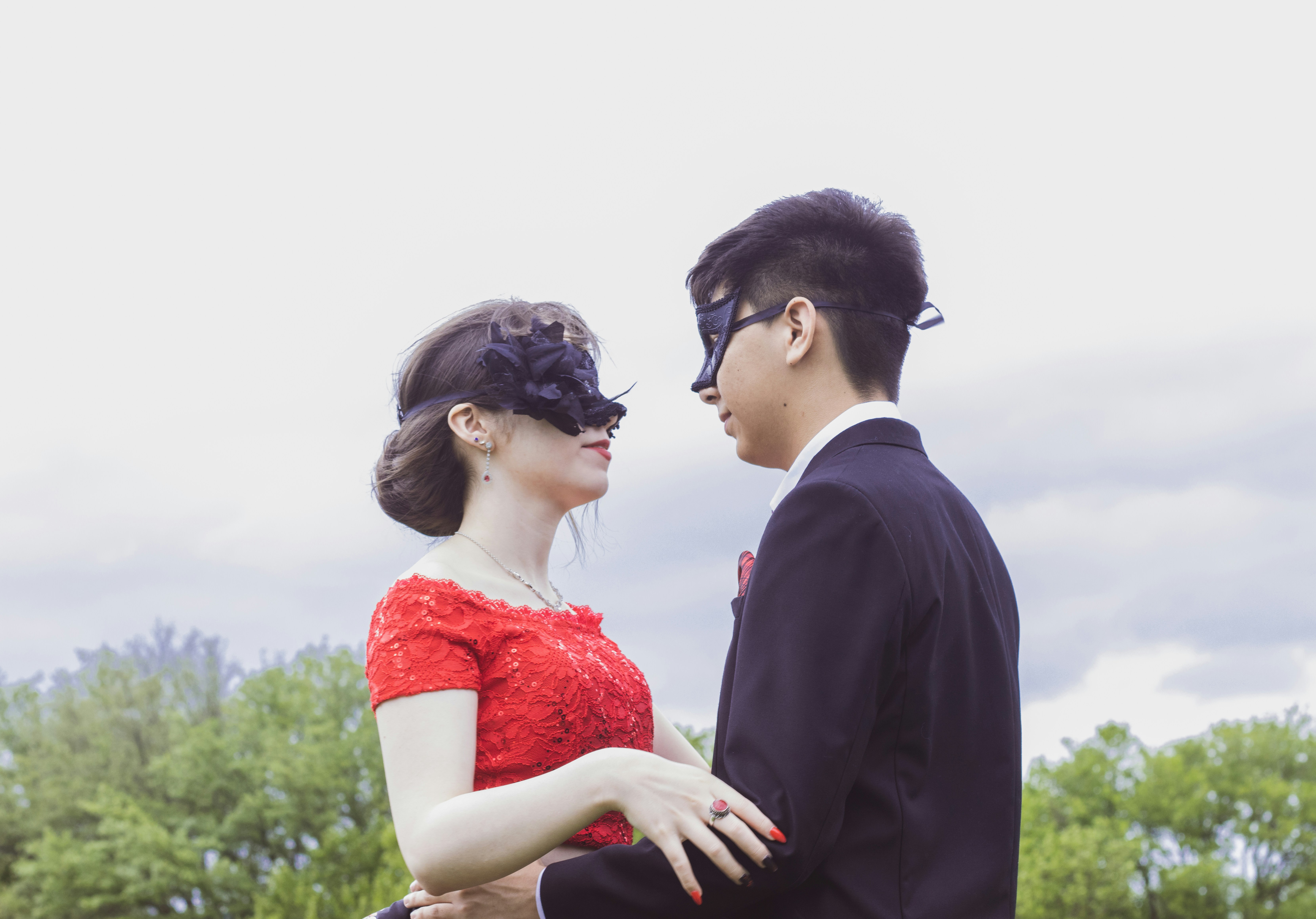 a man and a woman standing next to each other