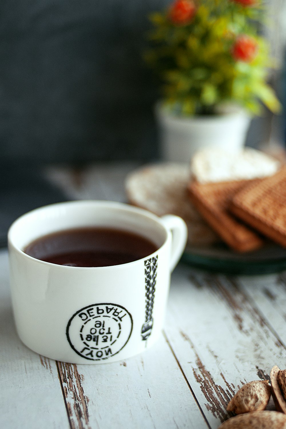 a close up of a cup of coffee on a table