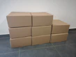 A collection of various sizes of tiko-boxes arranged aesthetically.