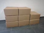 A collection of various sizes of tiko-boxes arranged aesthetically.