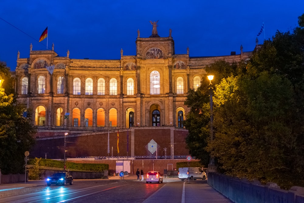 a large building with a lot of windows at night