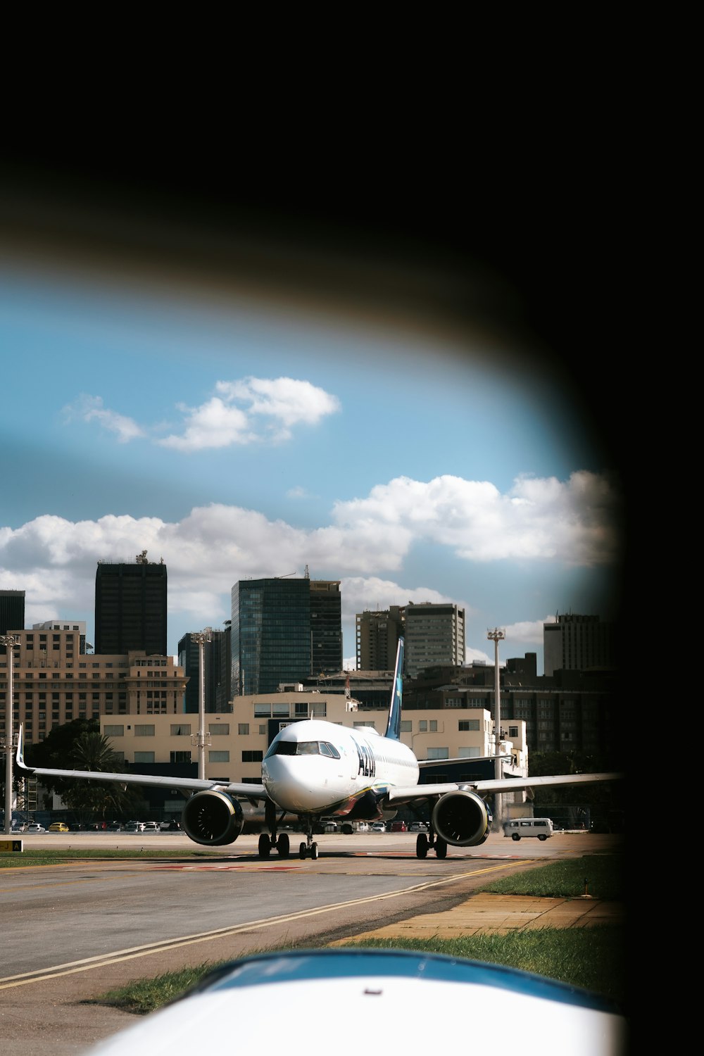 a large jetliner sitting on top of an airport runway