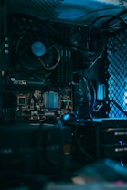 a close up of a computer motherboard with many wires