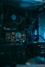 a close up of a computer motherboard with many wires