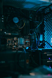 a close up of a computer motherboard with many wires