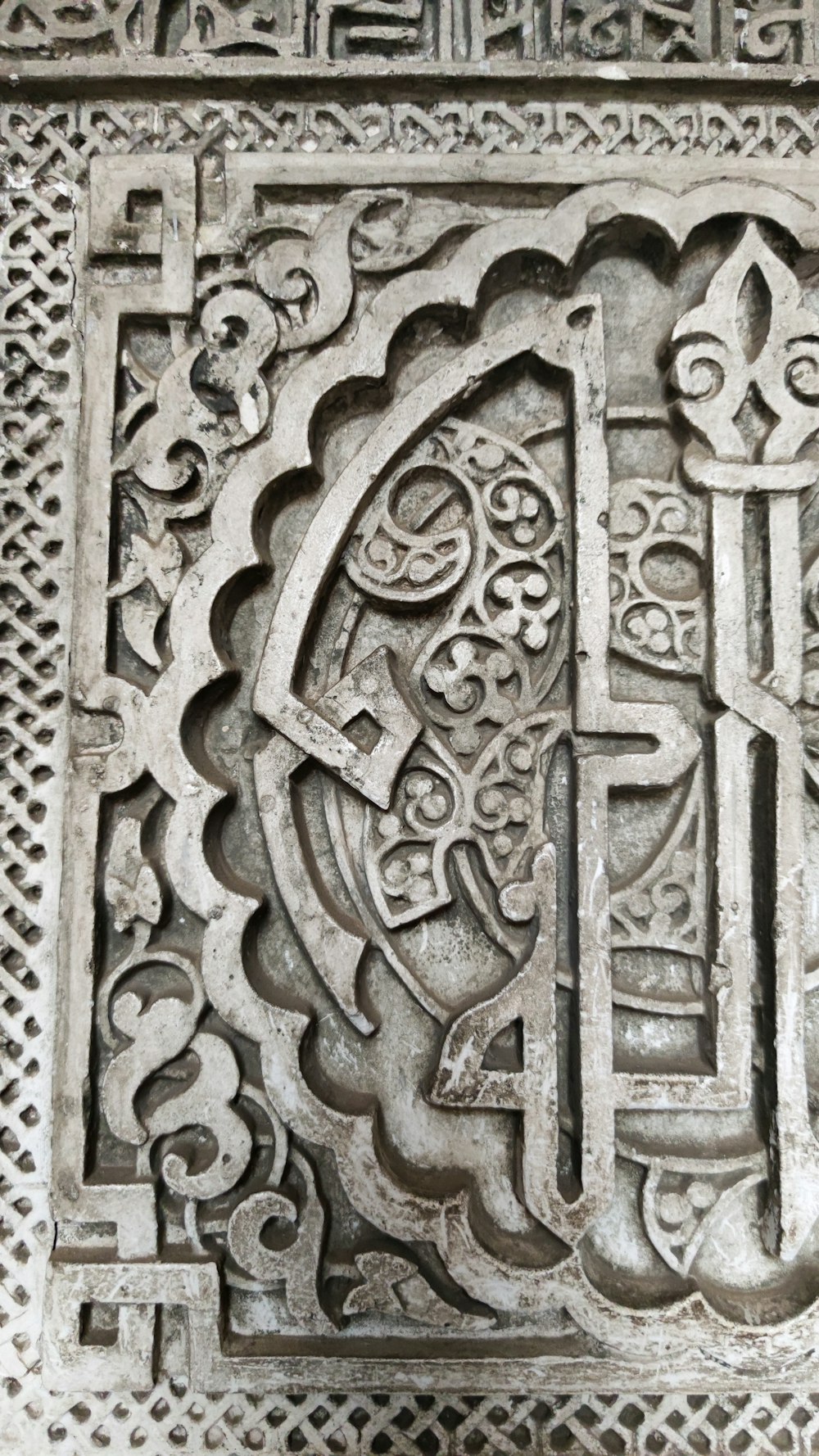 a close up of a decorative design on a wall