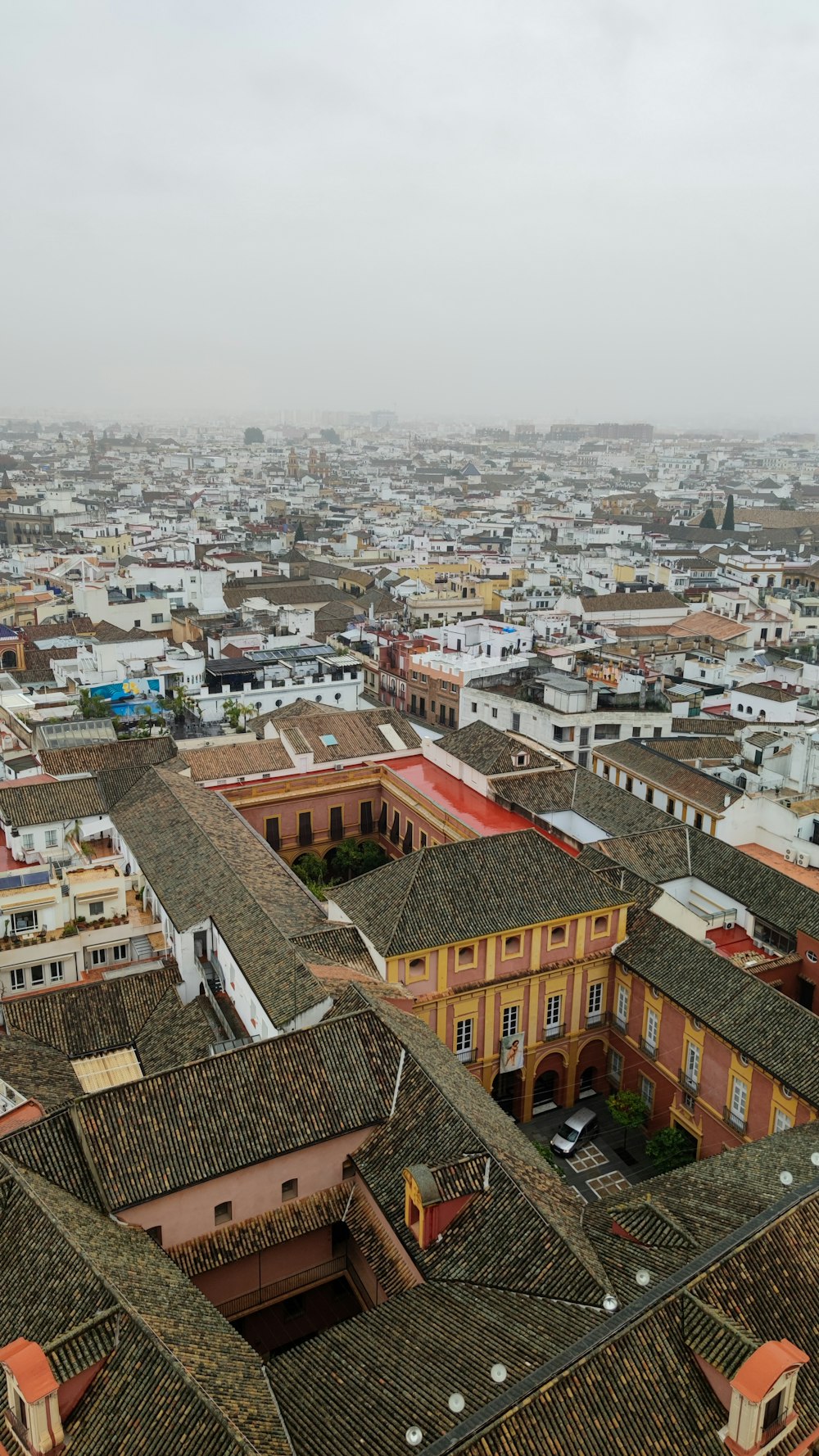 a view of a city from the top of a building