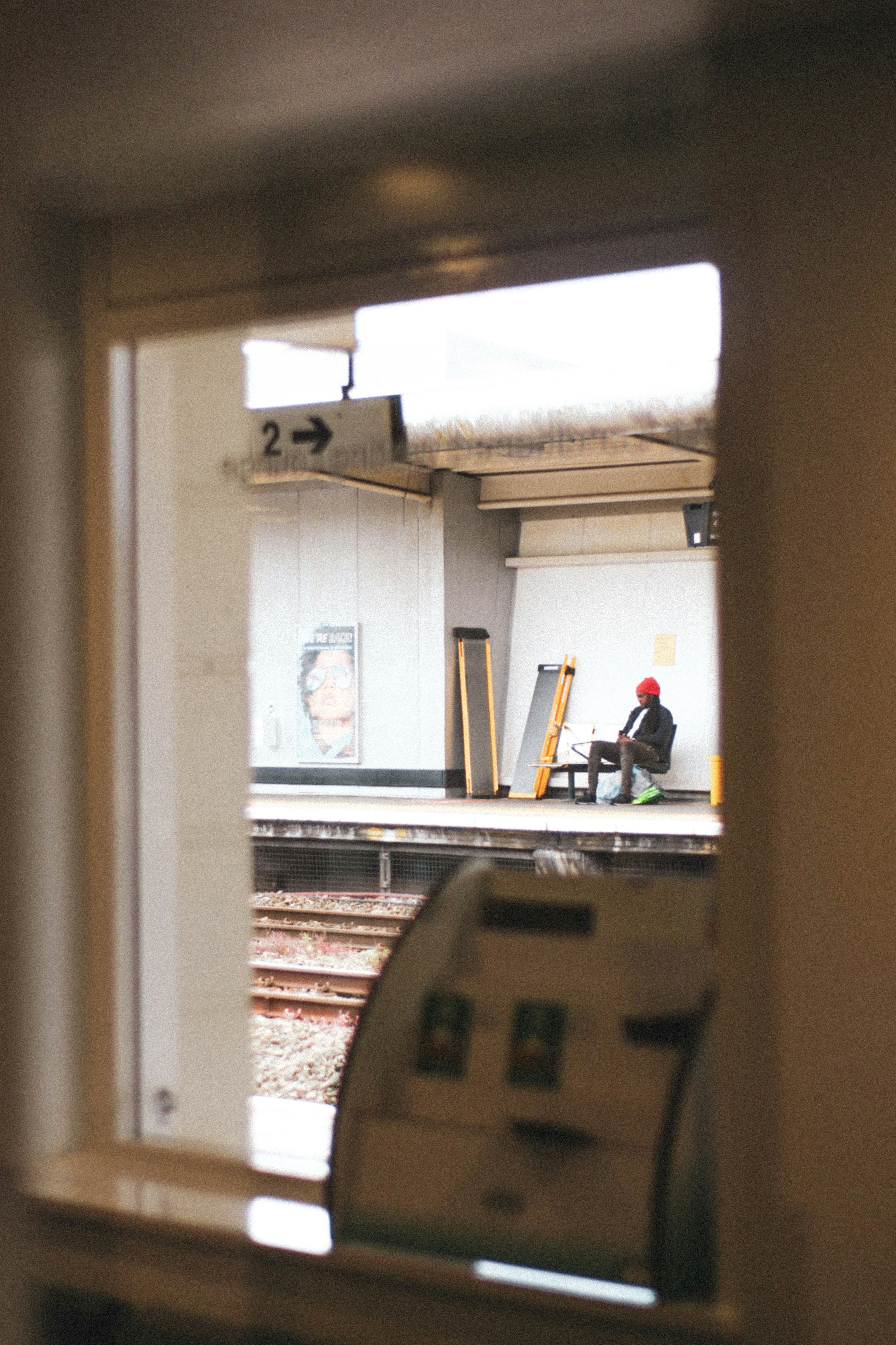A view of a train station through a window photo – Free Film ...