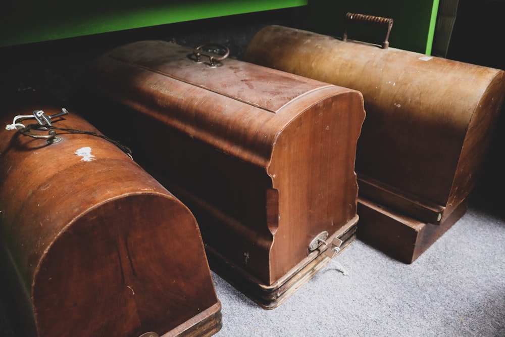 a couple of brown suitcases sitting next to each other