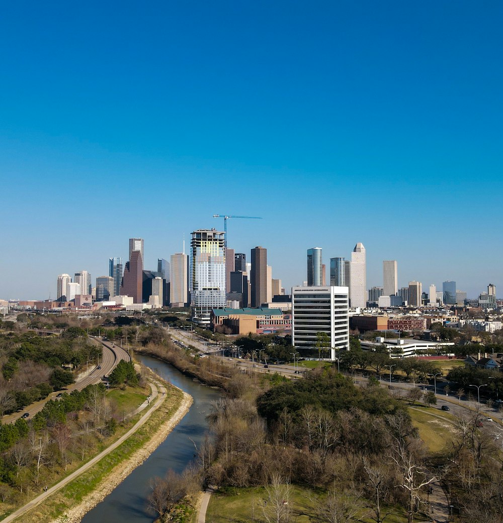 a city skyline with a river running through it