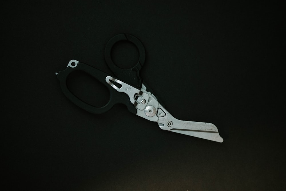 a pair of scissors sitting on top of a table