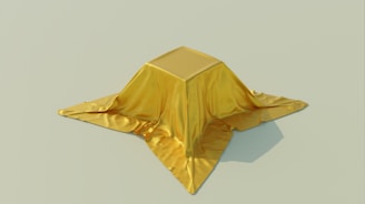 Minimalist display of Staylna products on a navy blue velvet cloth with subtle gold reflections.