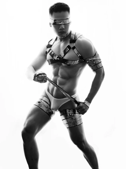 a man in a costume is posing for a picture