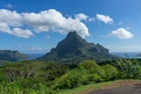 a view of a mountain and a body of water