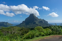 a view of a mountain and a body of water