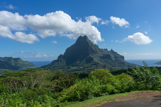 a view of a mountain and a body of water