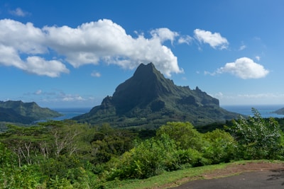 a view of a mountain and a body of water