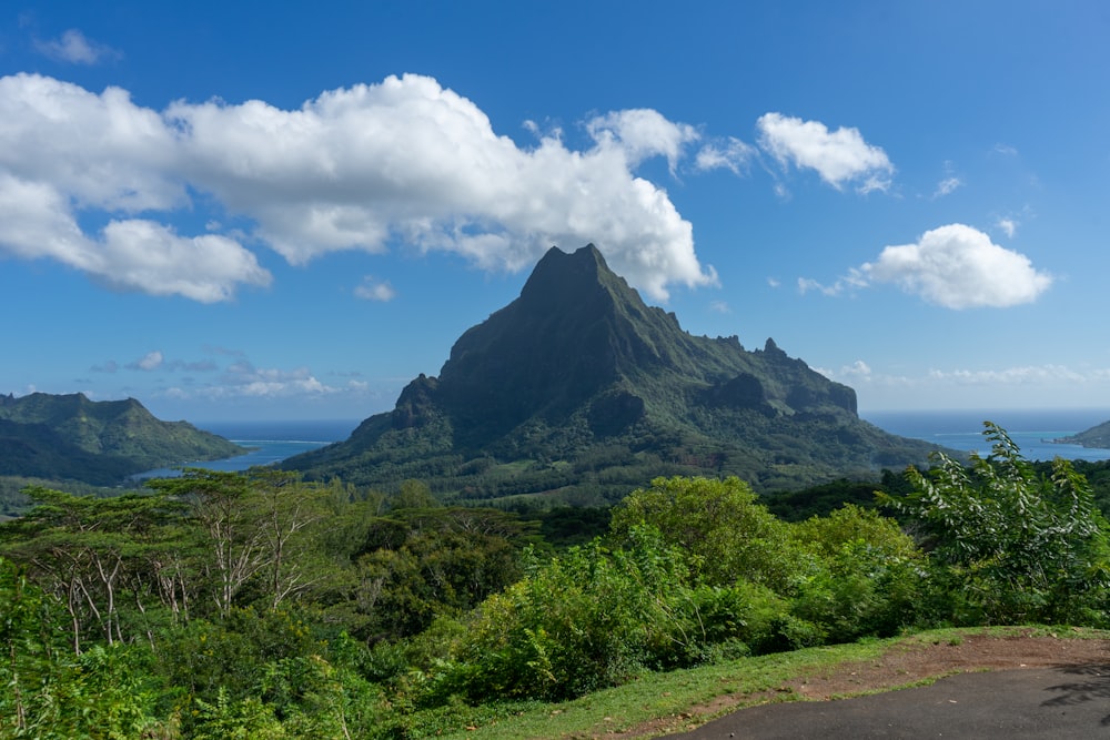 a view of a mountain and a body of water