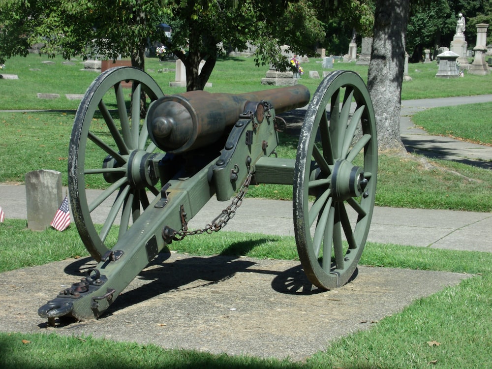 an old cannon is sitting on the ground